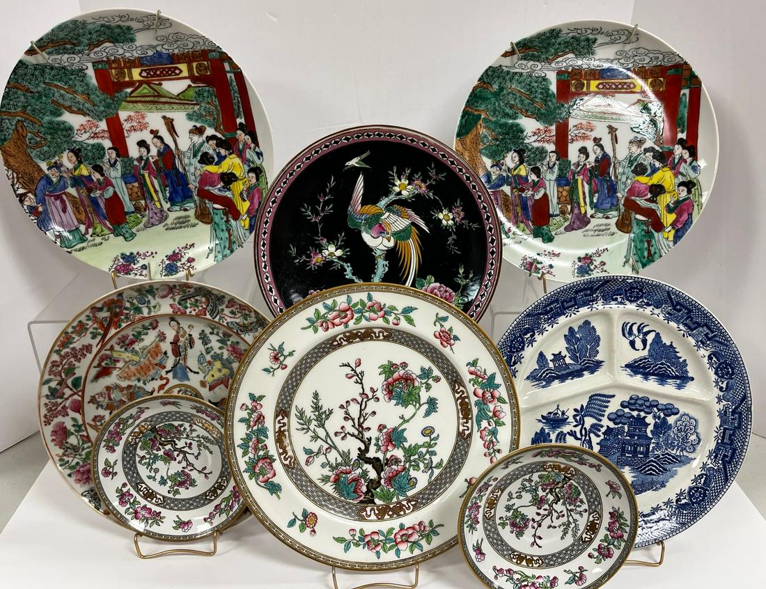 Eight Oriental themed china plates. (1 of 8)