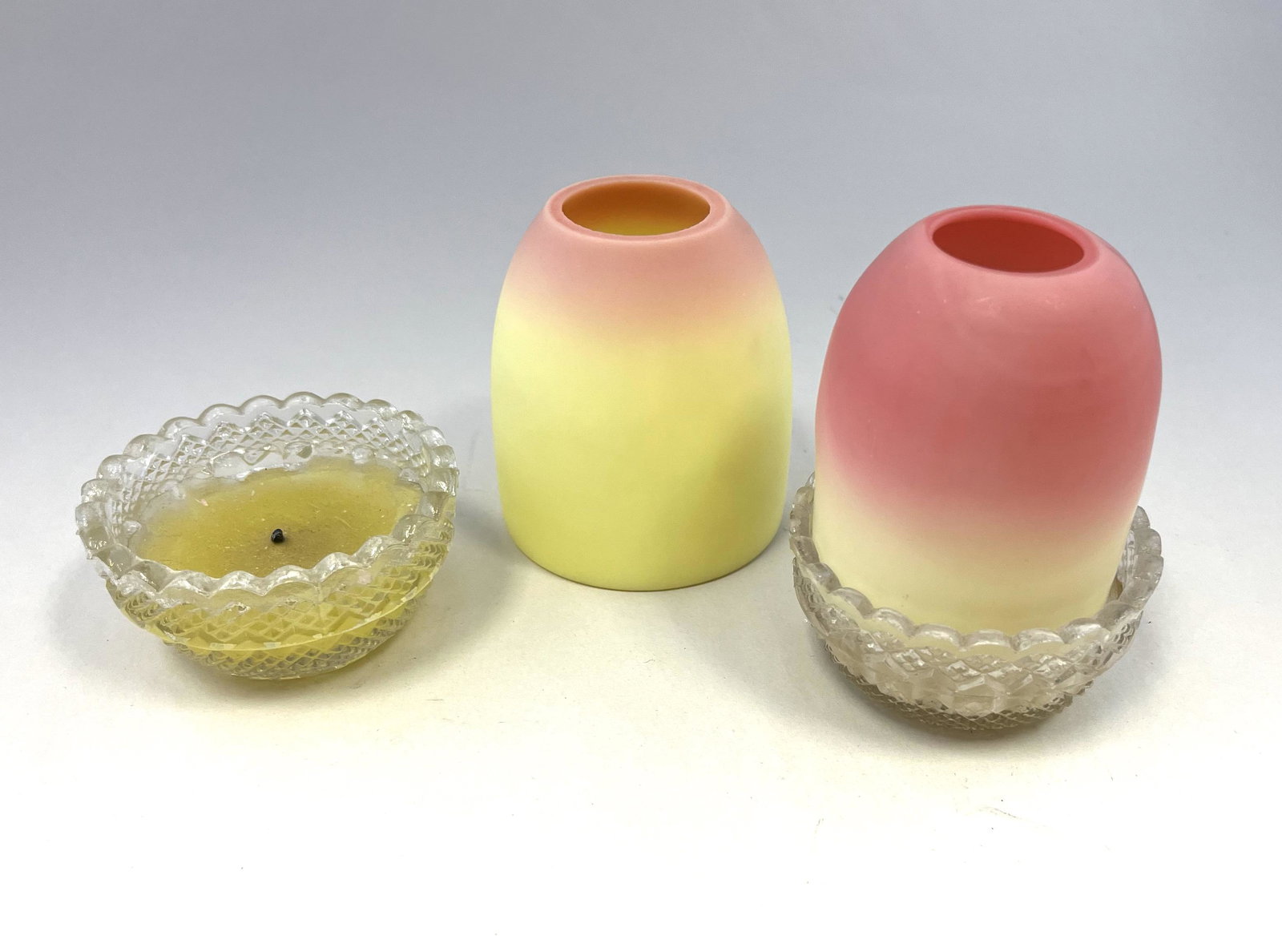 Burmese fairy lamp and parts: Webb Burmese fairy lamp set in clear holders, together with a single shade and single base, tallest 4" ht. Condition: one chip to shade