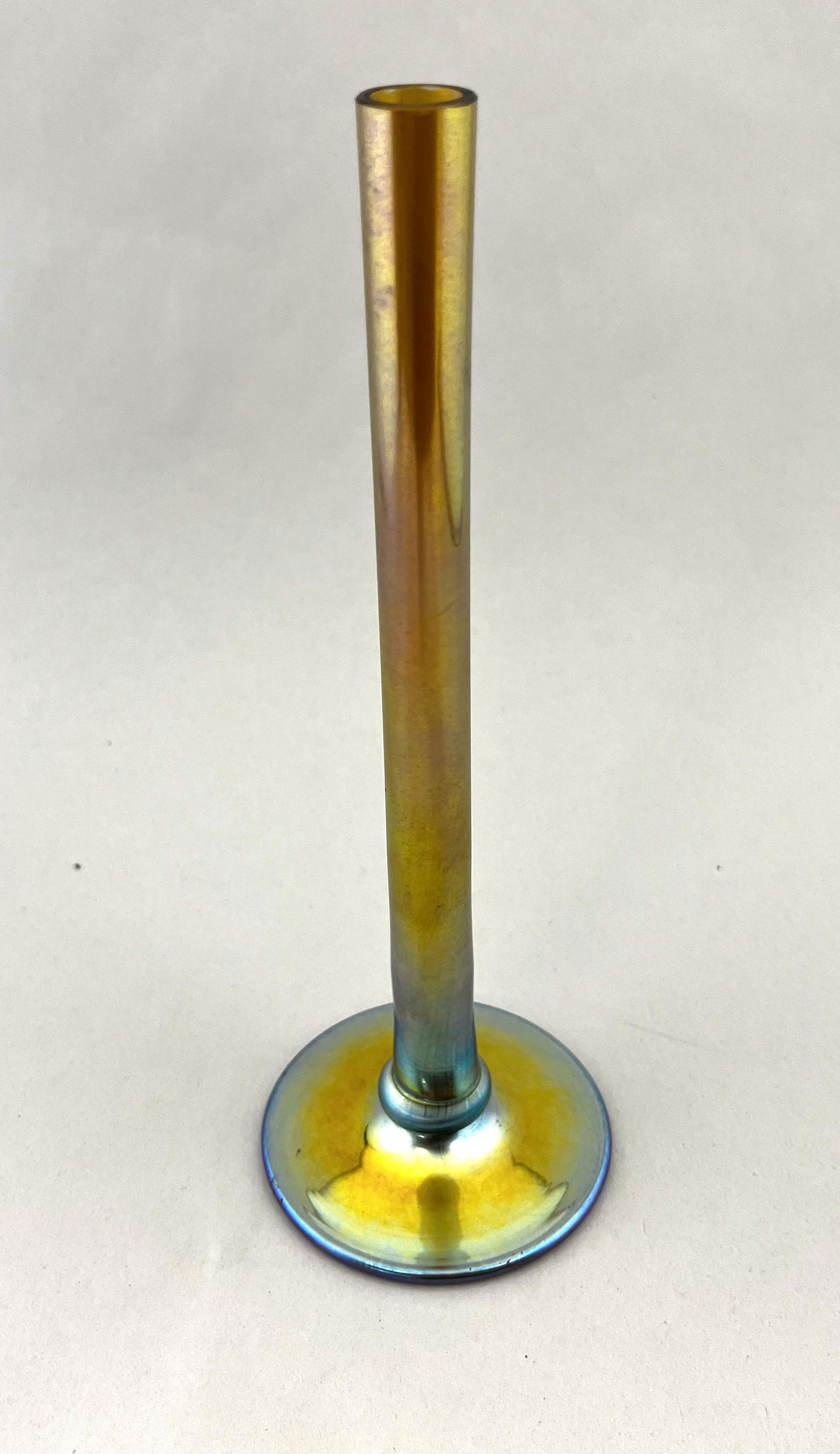 Steuben Gold Aurene bud vase: Steuben Gold Aurene bud vase with excellent color, signed Steuben Aurene, 8 1/4" ht. CONDITION: good with no defects found.