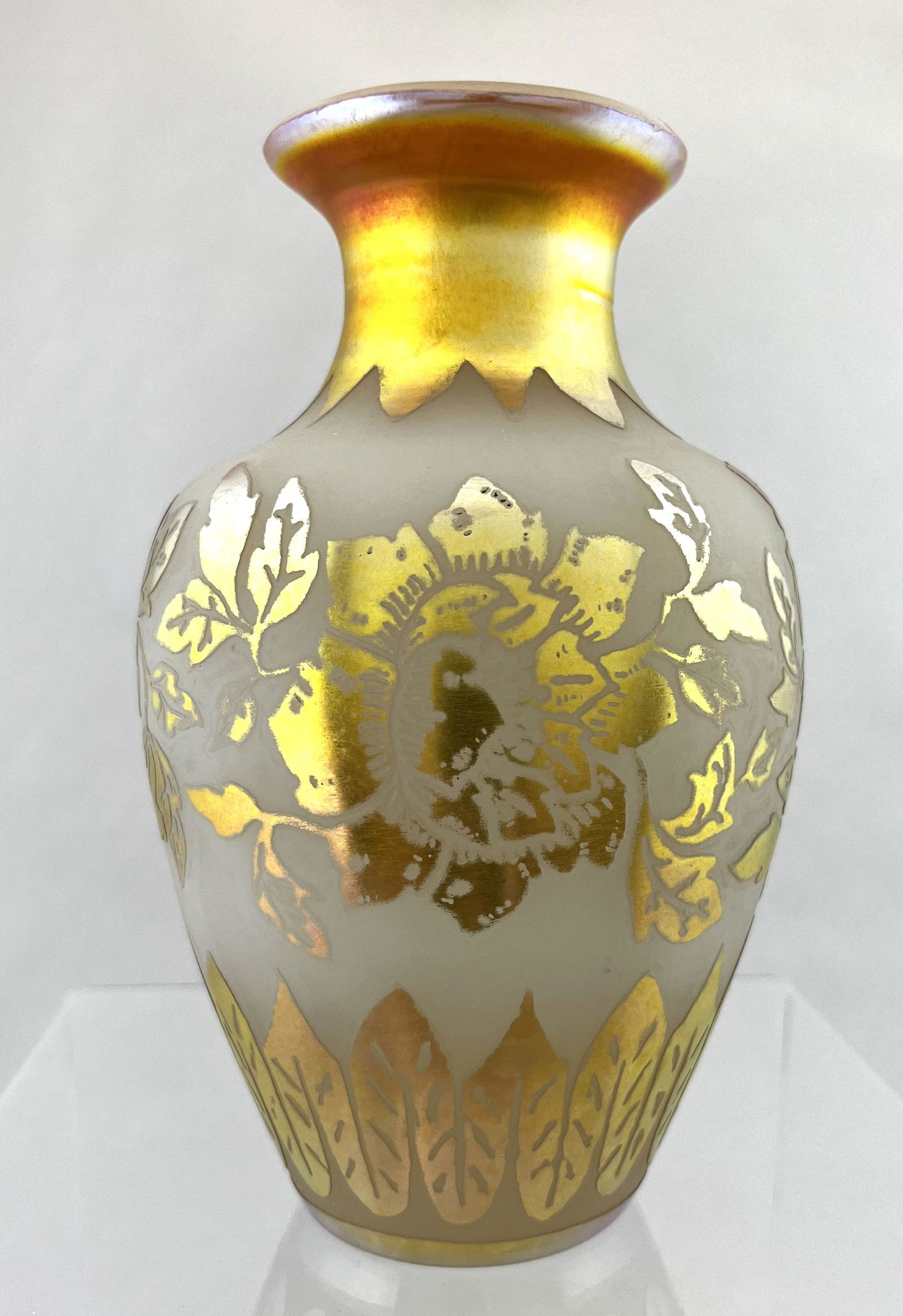 Steuben F. Carder ACB glass vase: Steuben shouldered form opal glass vase decorated with a Gold Aurene Art Deco flower design, signed F. Carder Steuben, 7 1/2' ht. CONDITION: good with no defects found.