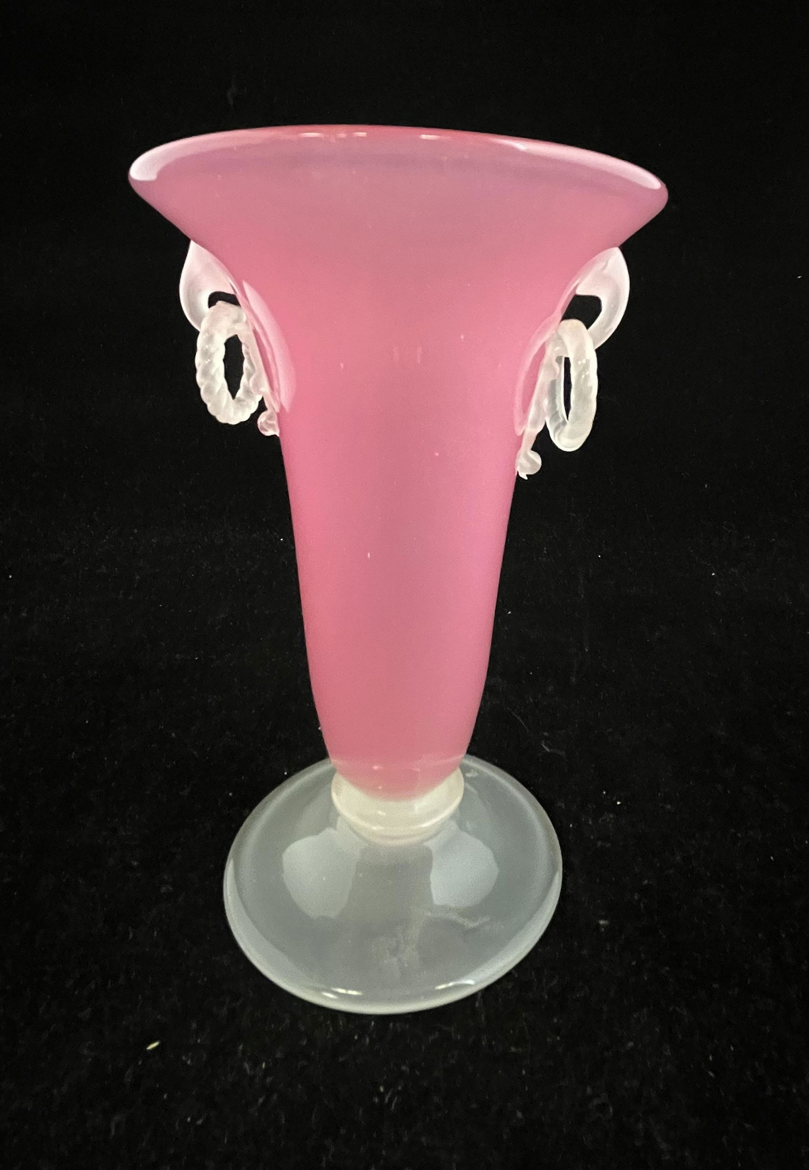 Steuben Rosaline two handle vase: Footed Steuben trumpet form Rosaline vase with two side ring handles, 6" ht. CONDITION: Good with no issues.