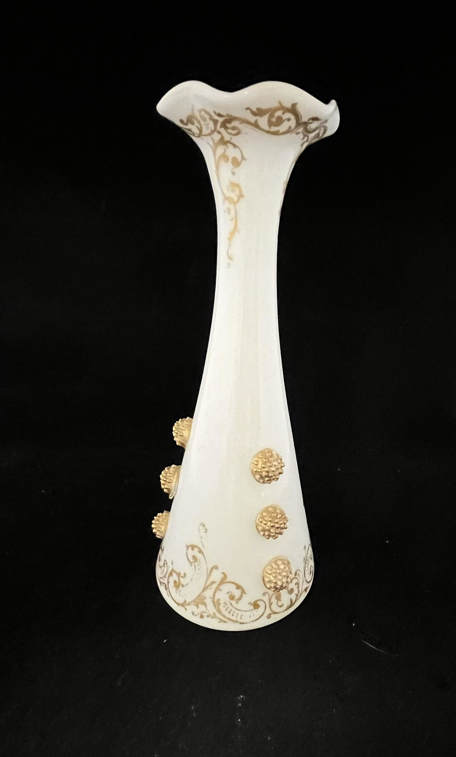 Mt. Washington Colonial Ware vase: Mt. Washington reverse trumpet form Colonial Ware glass vase with 9 large raise gilt raspberry prunts and adorn with a scrolling rim and foot, marked with the red factory backstamp, 12" ht. LITERATURE