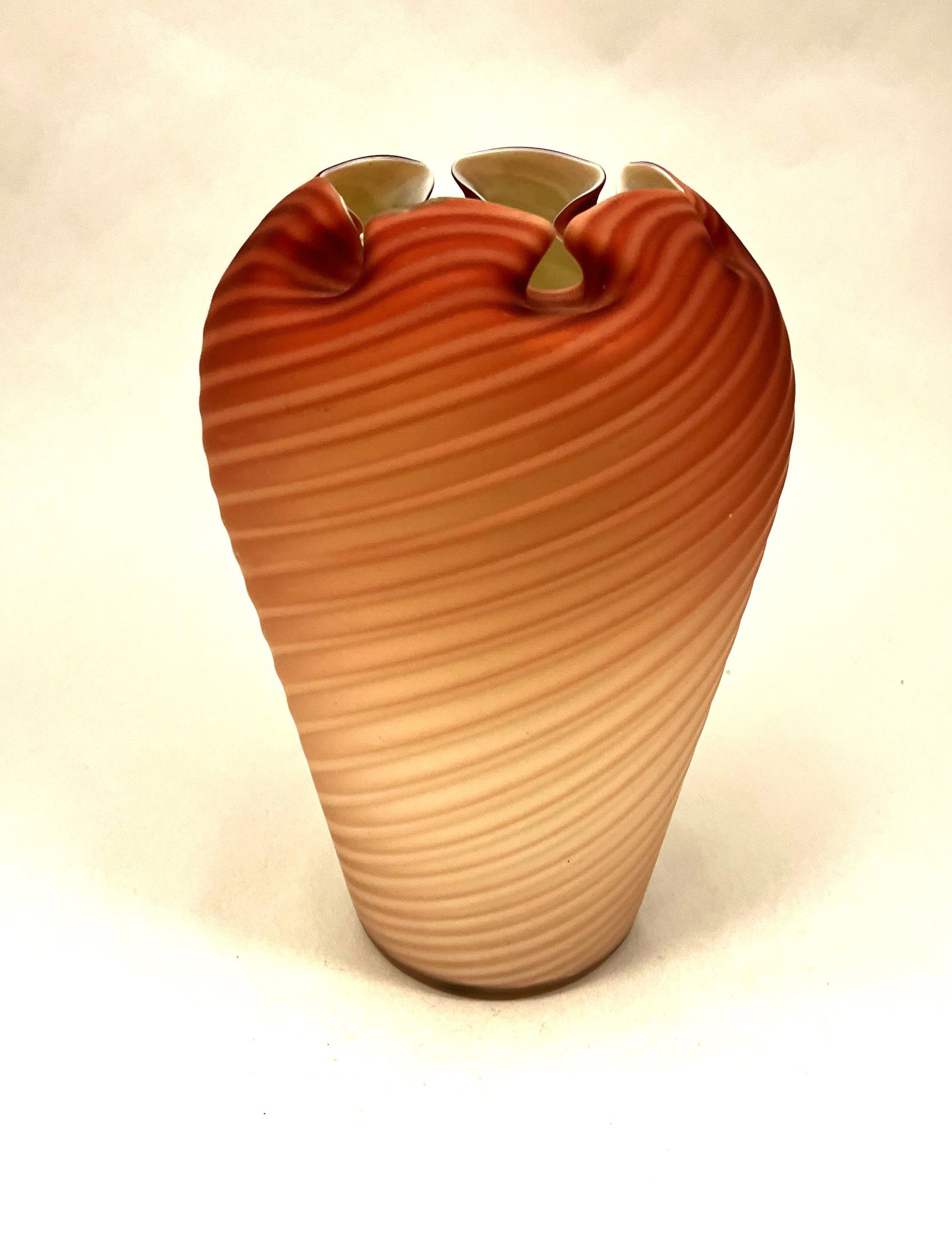 Stevens/Williams Pompeian Swirl vase: Stevens and Williams Pompeian Swirl vase with a crimped top in rose to light green 7" ht. CONDITION: rim with a flat chip see picture