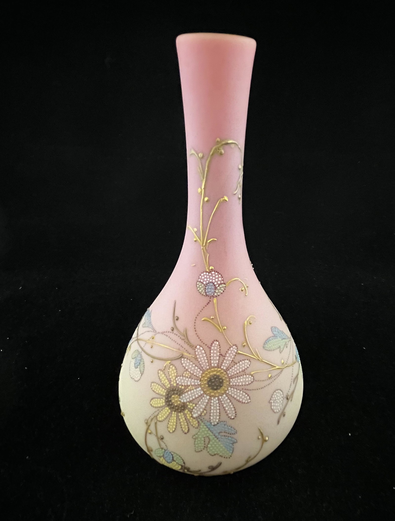 Mt. Washington Burmese vase: Mt. Washington Burmese bulbous stick vase decorated in the Queens pattern, 9 3/4" ht. CONDITION: good with no defects found.