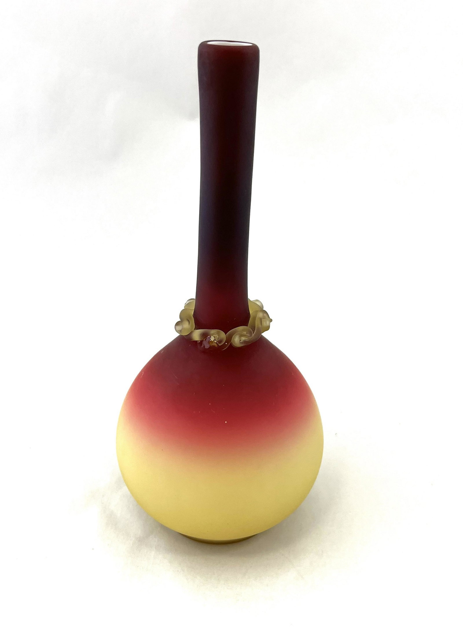 Wheeling Peachblow stick vase: Rare Wheeling Peachblow satin finish stick vase with a rigaree collar, 8" ht. NOTE: Seldom seen in a satin finish. CONDITION: good, one chip to the rigaree.