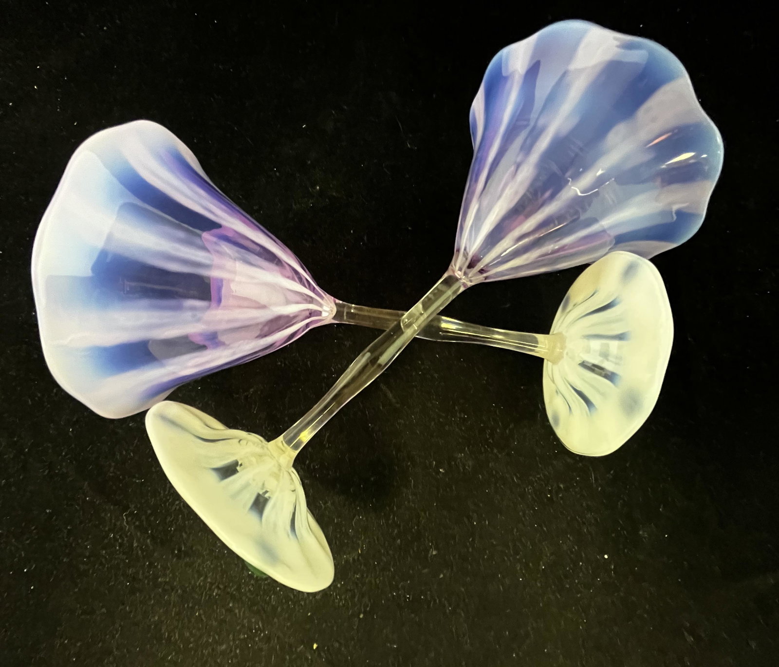 Pair of Tiffany Pastel goblets: Pair of Tiffany Favrile Pastel glass goblets in a rich Wisteria color, signed LCT Favrile 7 1/2' ht. CONDITION: good with no defects found.