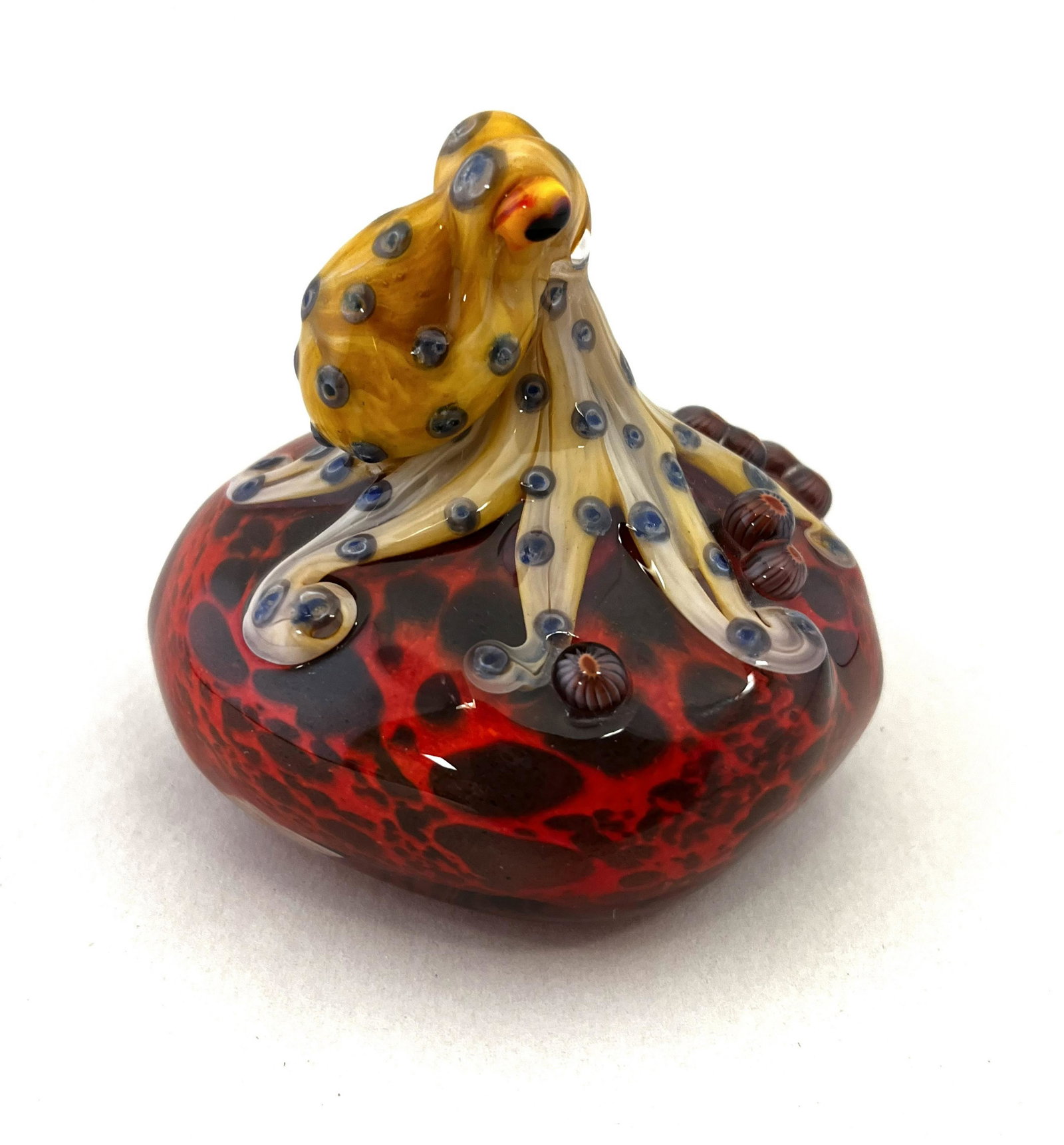 Orient and Flume figural paperweight: Orient and flume red paperweight with a figural Octopus, has original papers, signed Smallhouse 2008, 3 1/2' ht. CONDITION: good with no defects found.