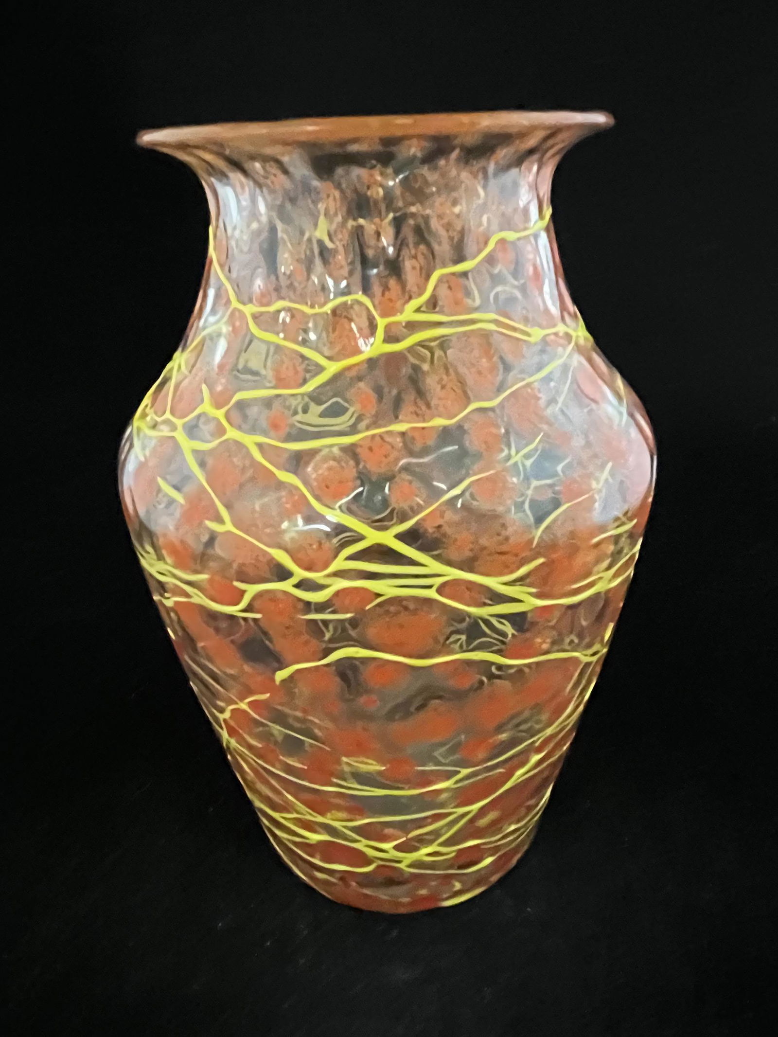 Loetz Schneeflocken glass vase: Loetz shouldered Schneeflocken glass vase in translucent glass decorated with orange spatter and yellow threading, 7 1/2" ht. PROVENANCE: Ernest Albanese. CONDITION: Good with no defects found.
