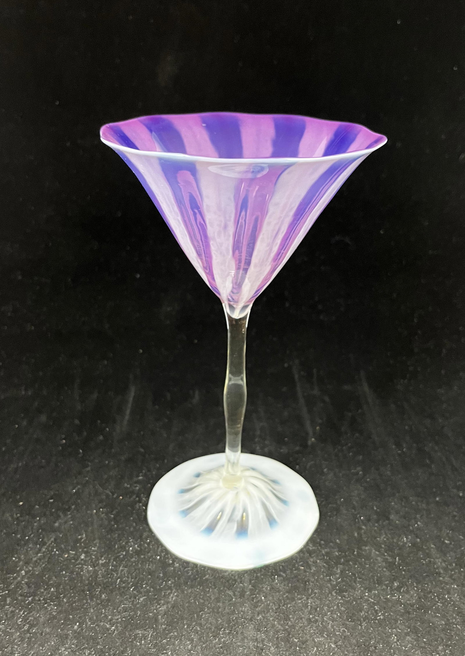 Tiffany purple pastel wine: Tiffany Favrile Pastel glass goblet in a rich Wisteria color, signed LCT Favrile 7 1/2" ht. CONDITION: Good with no defects found