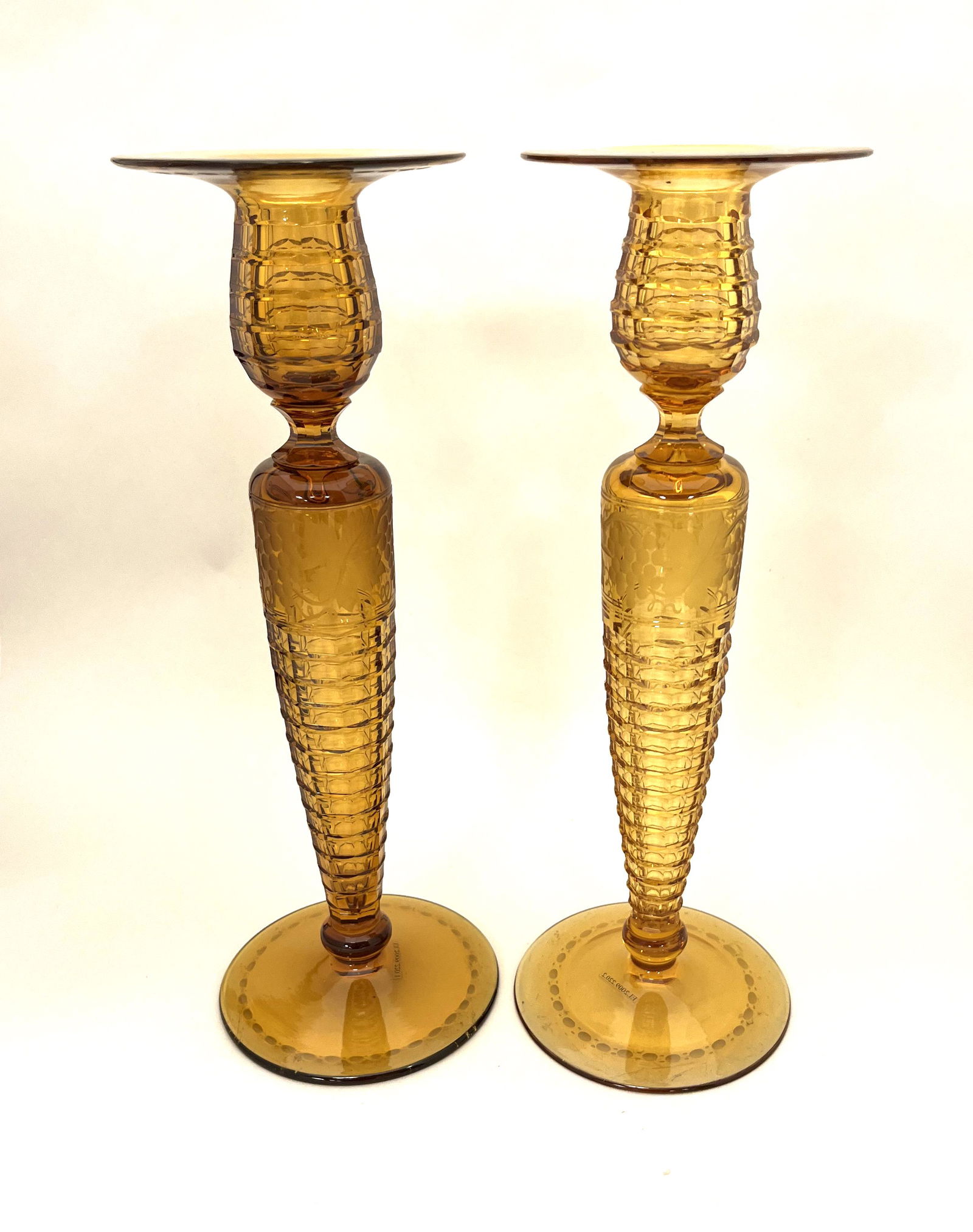 Pair of Sinclaire amber candlesticks (1 of 4)