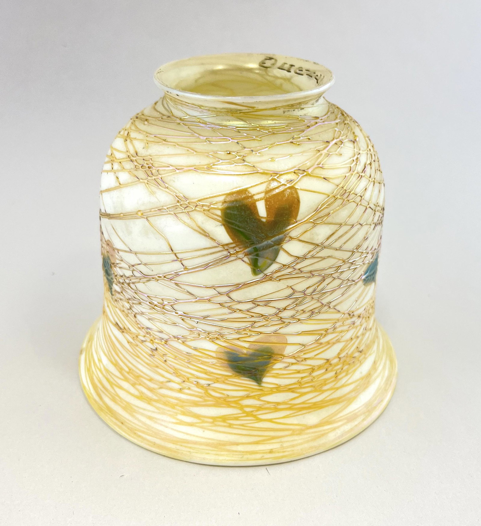 Quezal art glass shade: Quezal opal art glass shade with green and gold hearts and overall gold threading, signed Quezal, 4 1/2' ht. CONDITION: good, threading is almost perfect