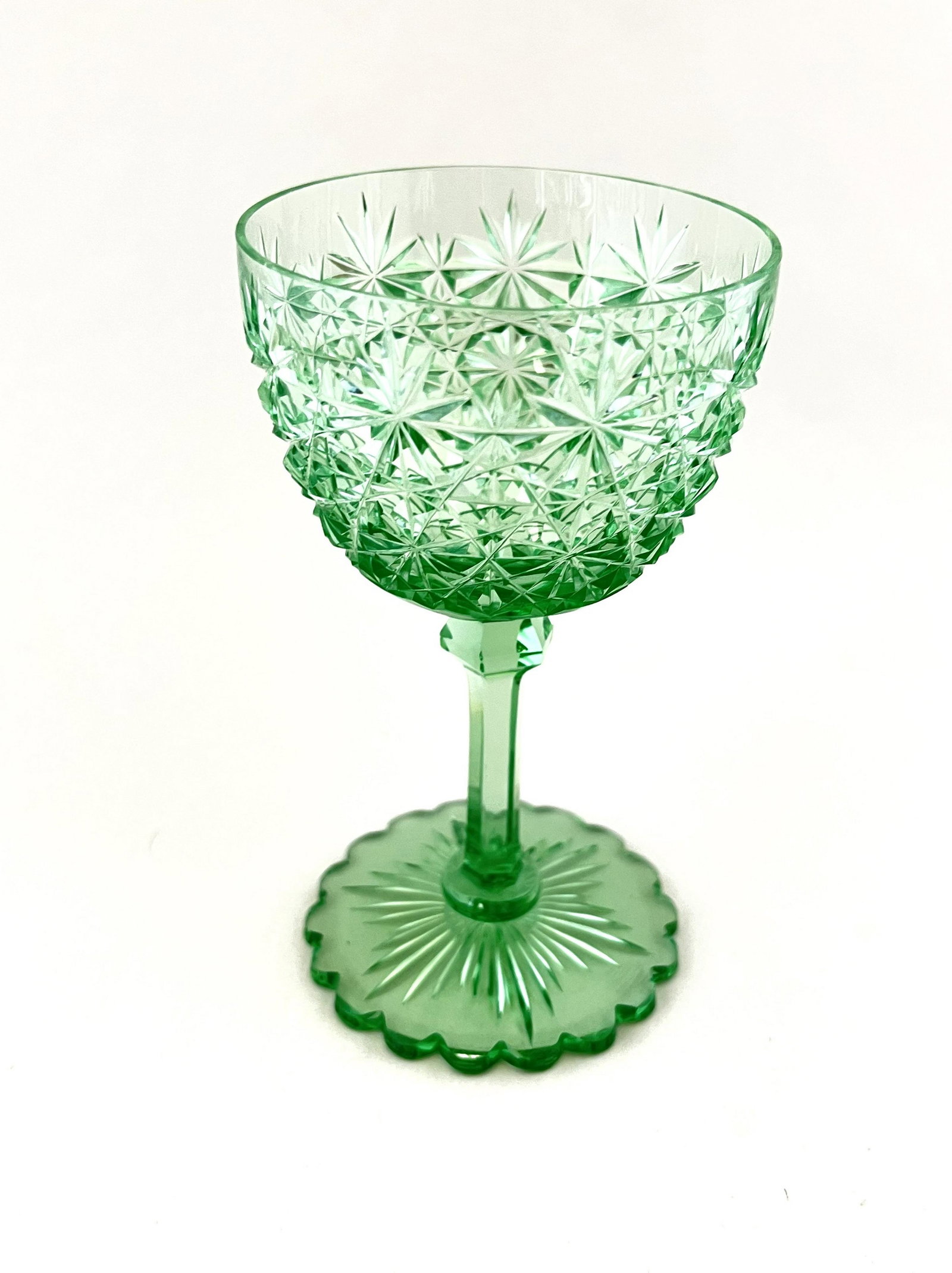 American Brilliant cut glass green goblet: American Brilliant cut glass goblet in the Russian pattern, 5" ht. CONDITION: good with no defects found.