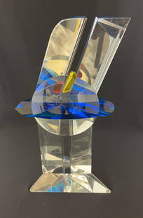Latchezar Boyadjiev glass sculpture: Latchezar Boyadjiev art glass sculpture, cut laminated and polished abstract sculpture in clear, blue, red, and yellow glass by Czech Republic artist, signed Latchezar Boyadjiev, 91, 15" ht. CONDITION
