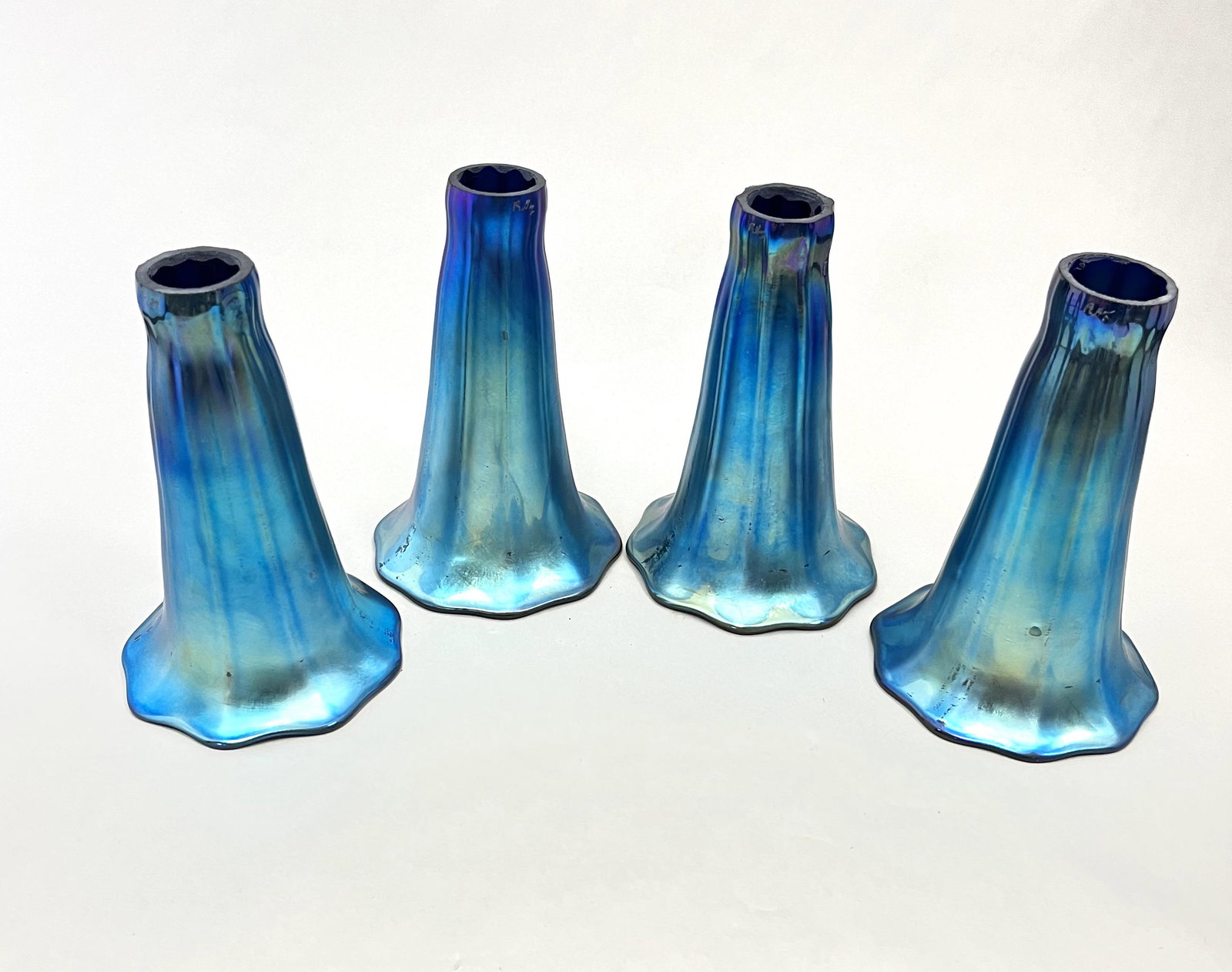 Four iridescent blue lily shades (1 of 4)