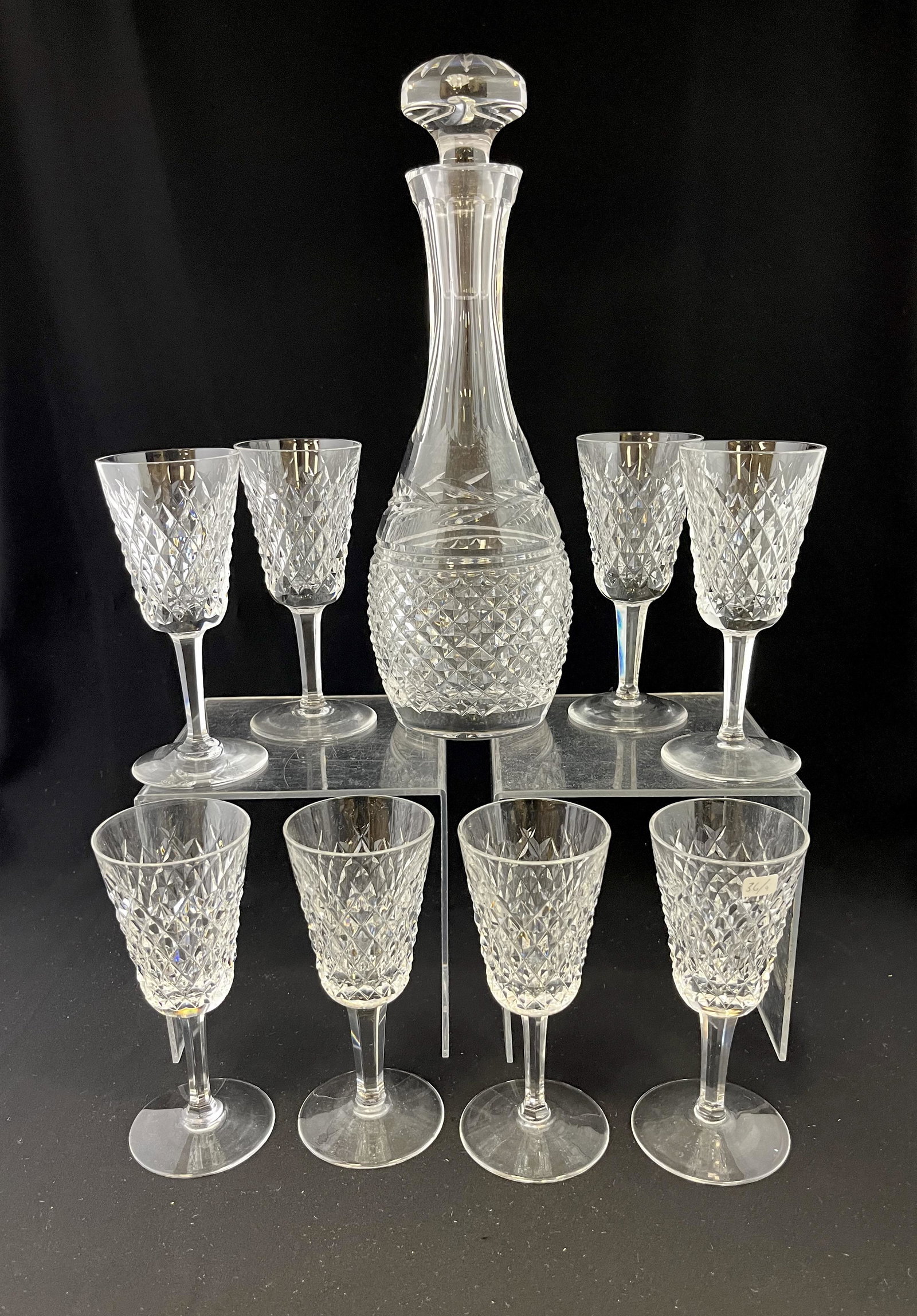 Waterford decanter set: Waterford decanter set including a signed bottle and eight signed Port wines, tallest 11" ht. CONDITION: no chips, cracks, repairs or material defects found. Jaremos attempts to call any material flaw