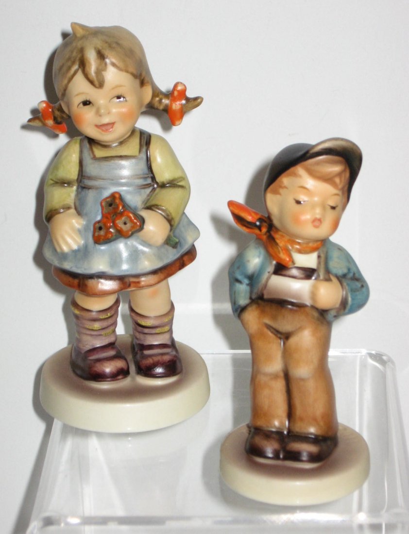 Two Hummel club figurine #548 "Flower Girl": together with #560 " Lucy Fellow", TMK7, tallest 4 1/2" ht. CONDITION: good with no issues.