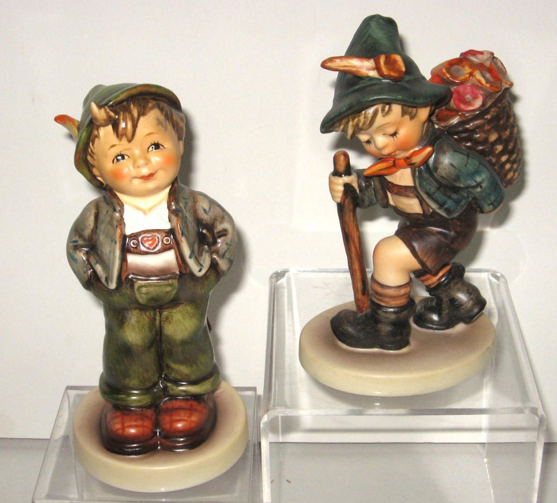 Two Hummel's #381 "Flower Vendor" TMK5: together with Hummel Club piece 429 "Hello World" TMK7, 5 1/2" ht. CONDITION: good with no issues.