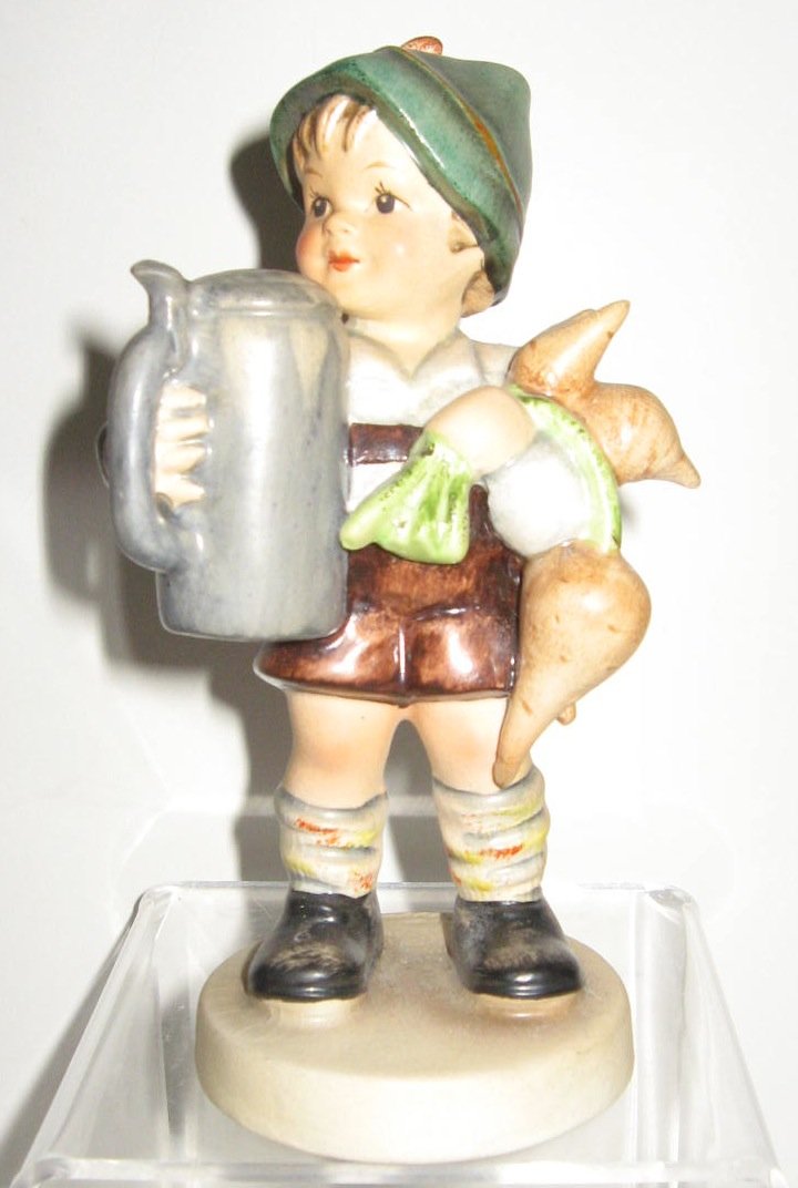 Rare Hummel #78 "For Father": of a boy holding a beer, has typical incised M I Hummel on the base but has no date mark only marked in ink Made in US zone Germany and numbered 78, 5 1/2" ht. CONDITION: good with no issues.