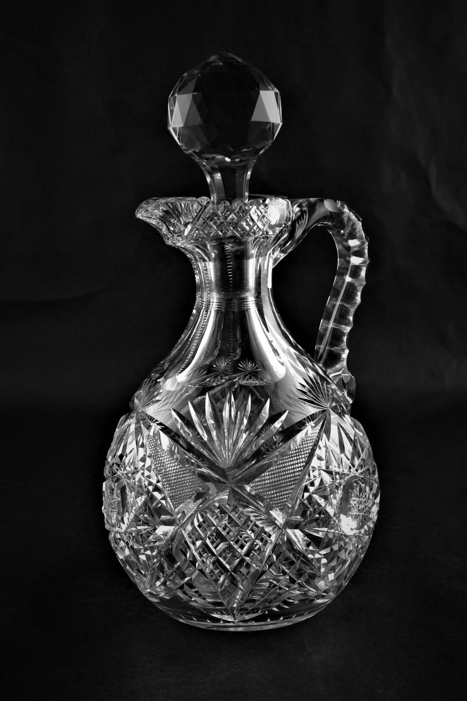 Libbey Duckbill Decanter.: Libbey "Corinthian" Duckbill Decanter. The extended spout sets this apart form other decanters. Motifs include 16 point hob stars, crosshatch, strawberry diamond and triple notched handle, 11" ht.
