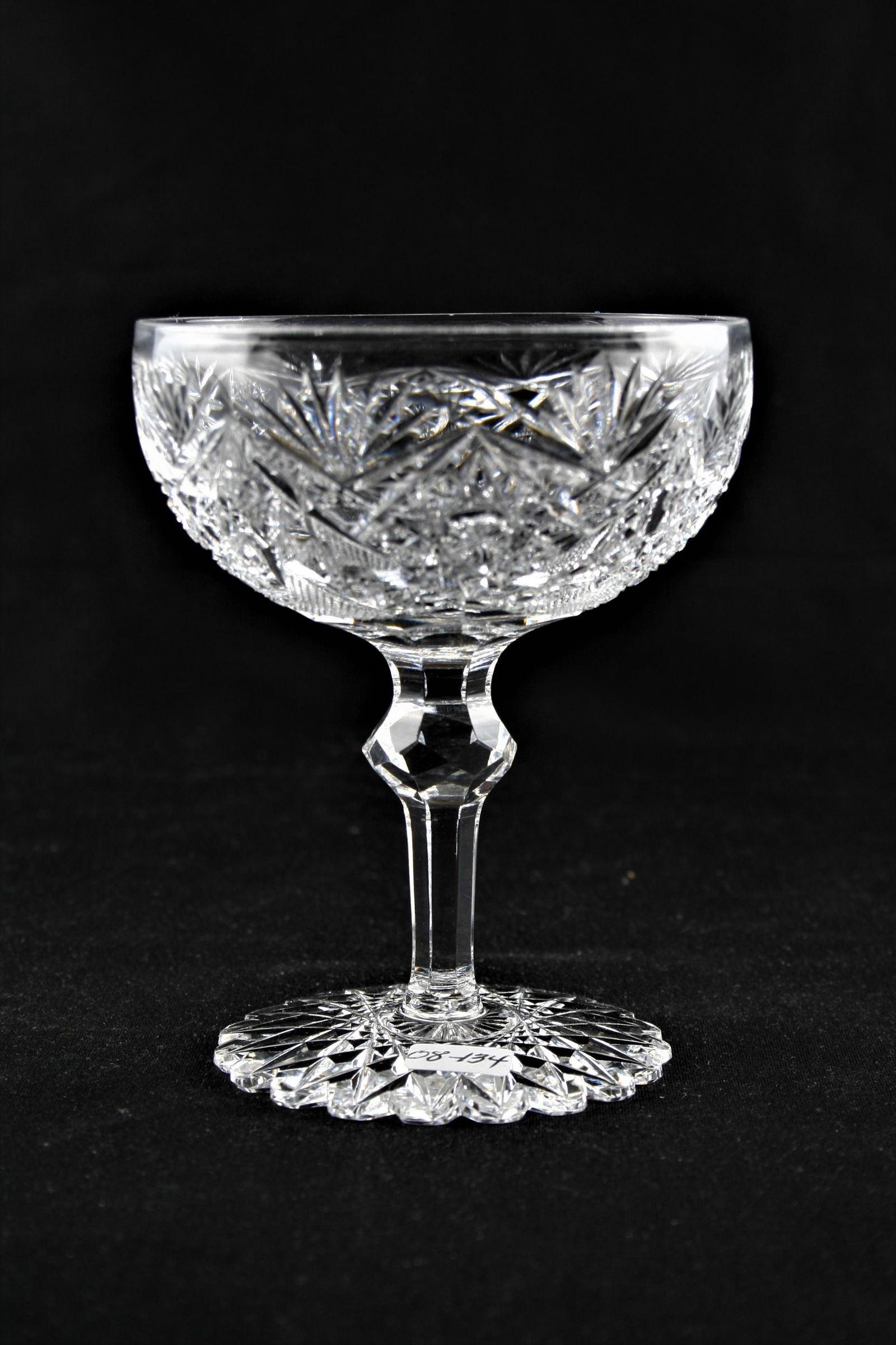 Two saucer Champagne: Two saucer Champagne with lapidary knob on stem and 20 point hob star on foot, 4 1/2" ht.