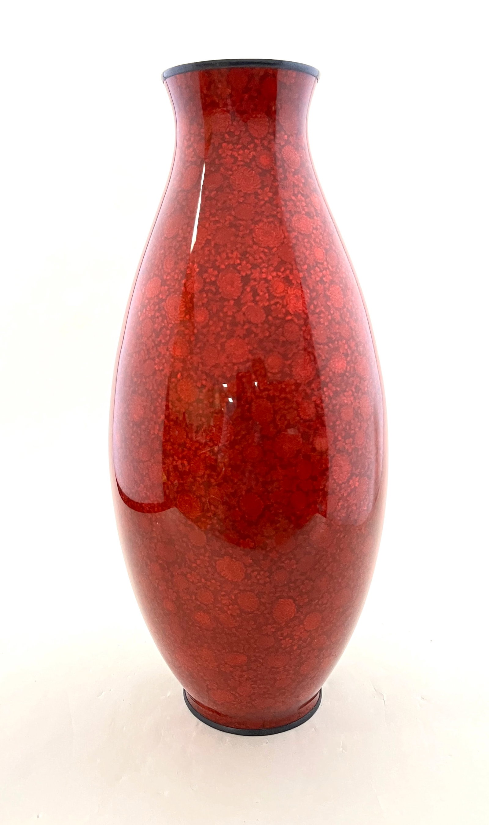 Japanese Meiji Cloisonne vase: Japanese Meiji Cloisonne vase in mottled red, 12 1/4" ht. CONDITION: no chips, cracks, repairs or material defects found. Jaremos attempts to call any material flaw that affects the price, but minor s