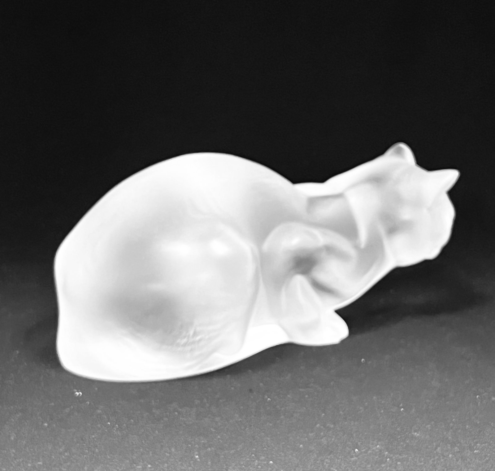 Lalique frosted glass cat: Lalique setted glass cat, signed Lalique, 9" long. CONDITION: chip to one ear