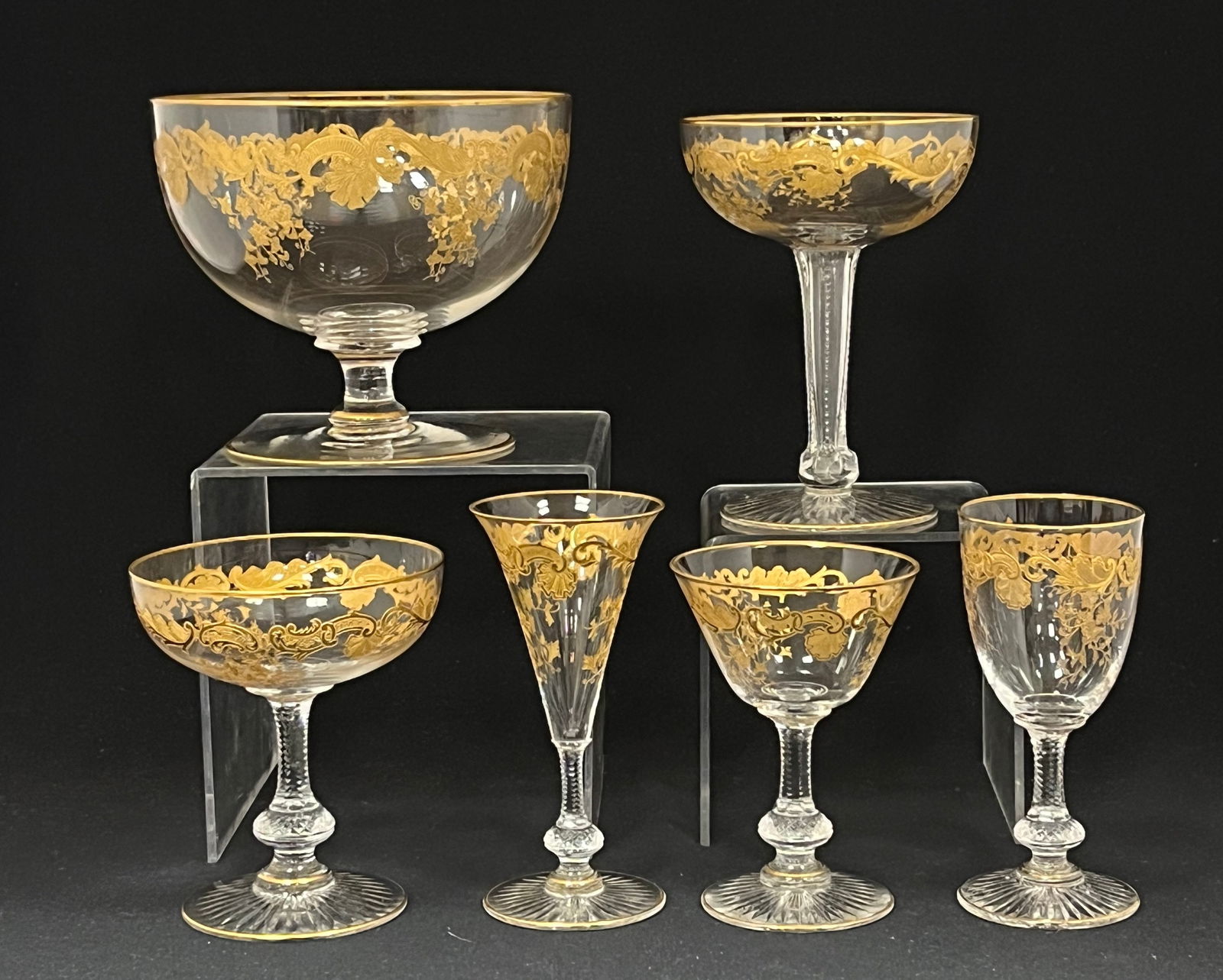 Group of Moser various shaped goblets: Group of 6 various shaped goblets including a grapefuit with insert decorated with a guilded acid cut back Rococo and floral pattern essentially identical to one employed by the Honesdale Decorating C