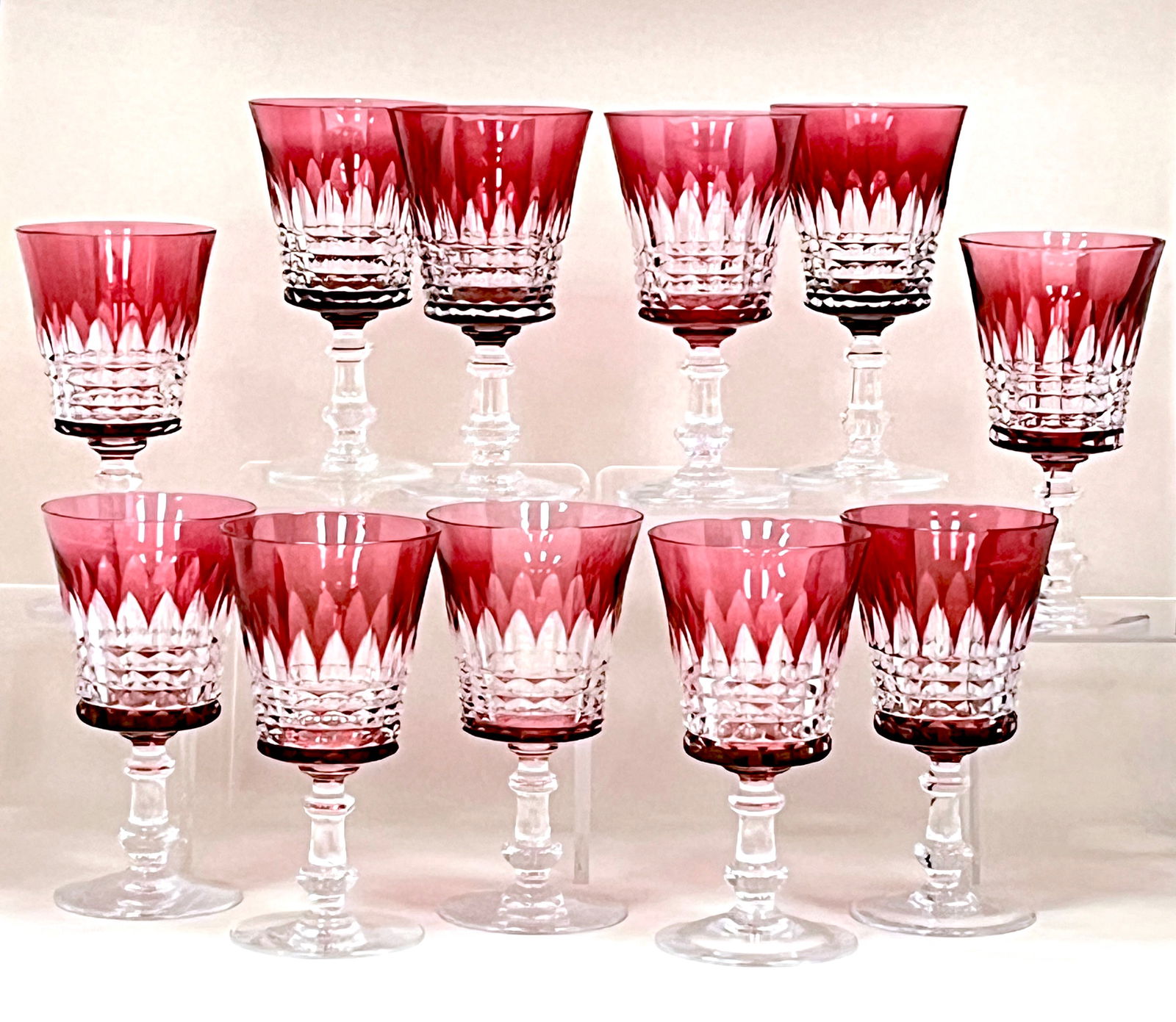 Set of Val St. Lambert ruby goblets: Set of 11 Val. St. Lambert ruby cut to clear goblets, each signed VSL. Ht. 6 1/4". CONDITION: no chips, cracks, repairs or material defects found. Jaremos attempts to call any material flaw that affec