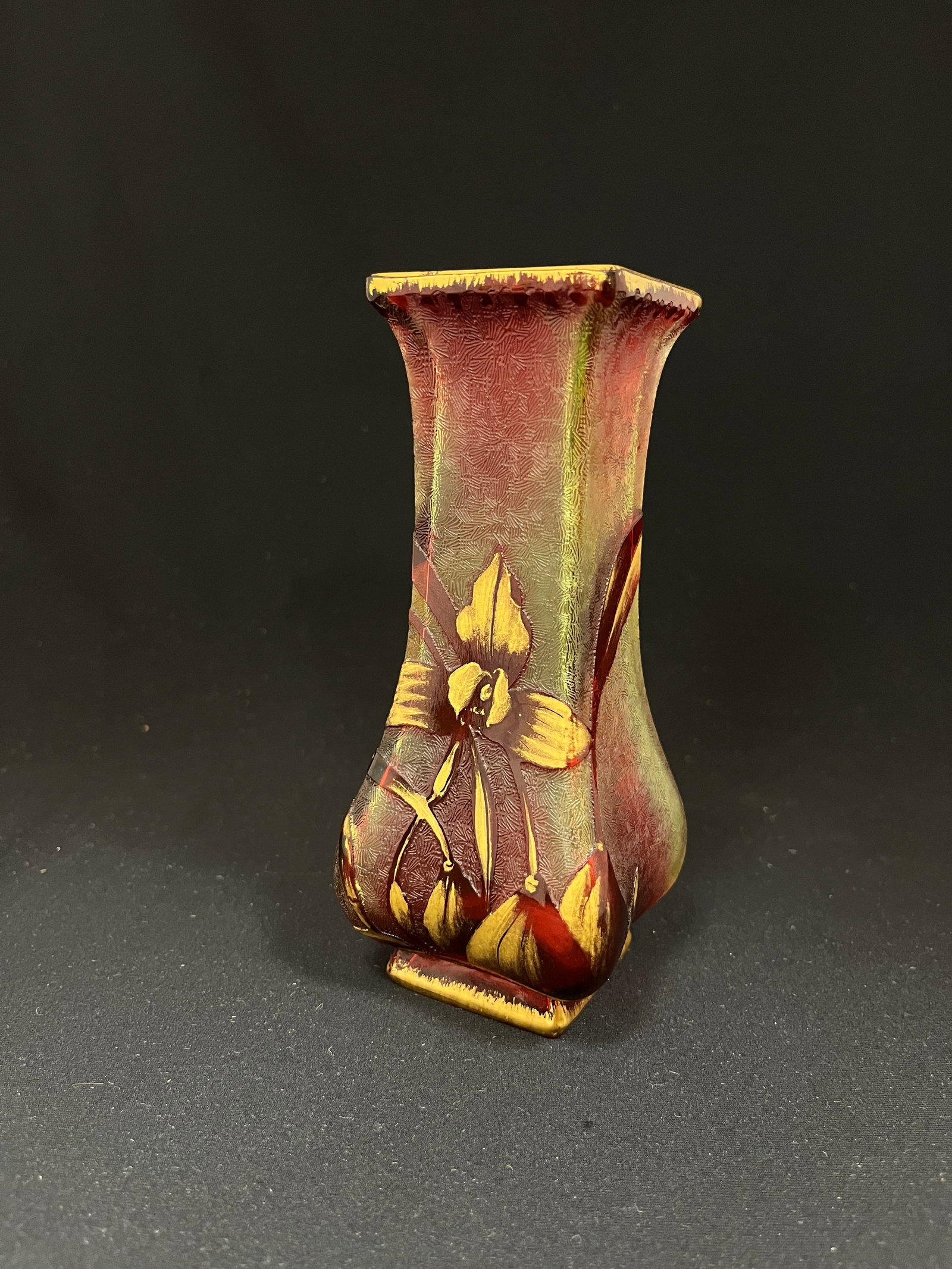 Baccarat cameo glass vase: Green and red textured glass vase decorated with a gold over ruby stemmed flowers, attributed to Baccarat based on shape, 6" ht. CONDITION: no chips, cracks, repairs or material defects found. Jaremos