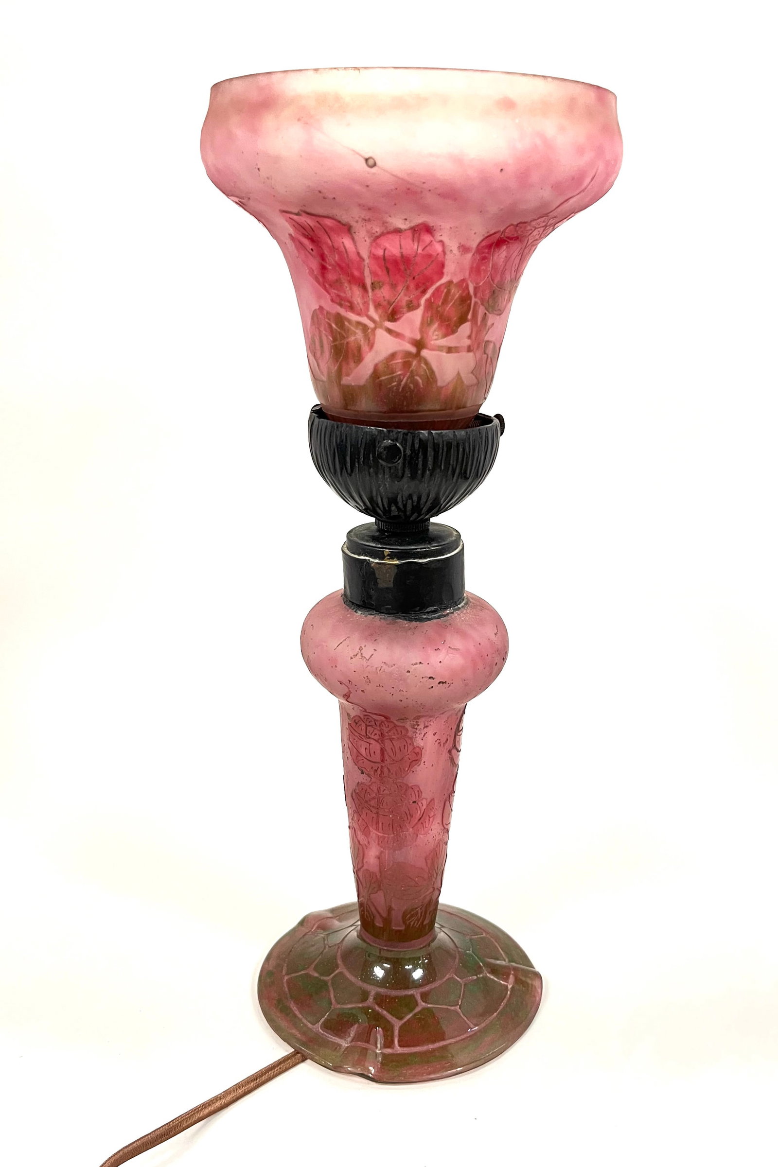 Le Verre Francais cameo lamp: Le Verre Francais pink cameo glass shade with red roses fitted to a matching green and pink base, shade with a candy cane signature, 13" ht. CONDITION: no chips, cracks, repairs or material defects fo