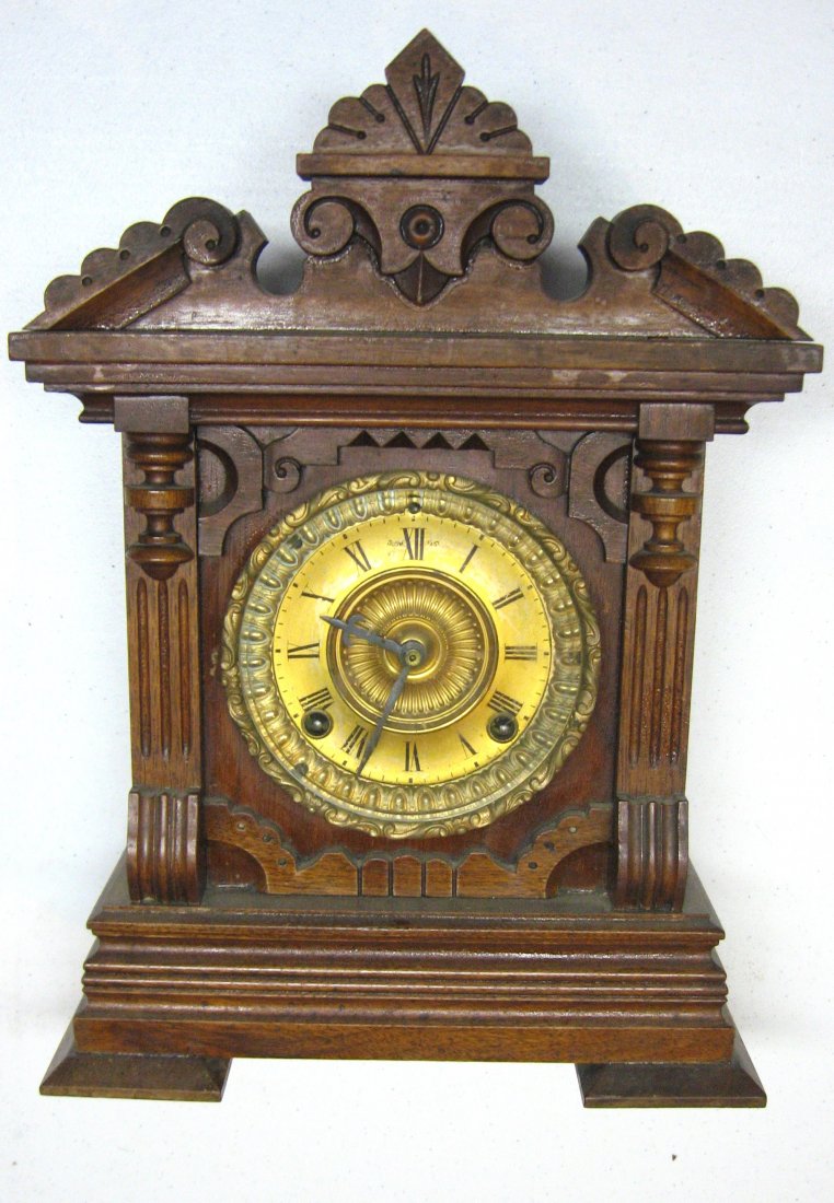 Ansonia "Summit" walnut mantel clock,: circa 1890 Empire style time and strike clock with pie crust bezel and beveled glass, 15" ht.