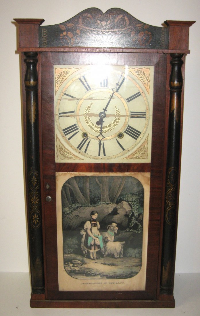 Seymour and Hall walnut shelf clock.: circa 1810 Empire style with stenciled Amish scrolling and pictorial titled Shepherdess of the Alps, 30 hr wood works, 33" ht.