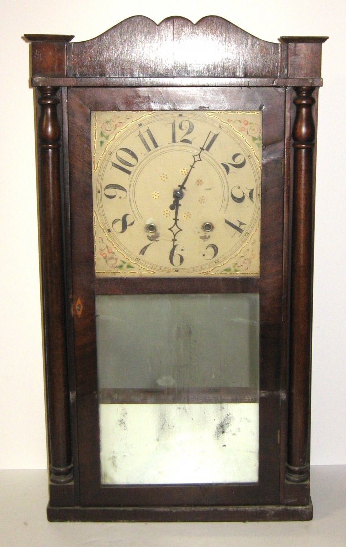 Putnam Bailey mirror front shelf clock,: circa 1820 Empire style clock with wood works, one day time and strike, 33" ht.