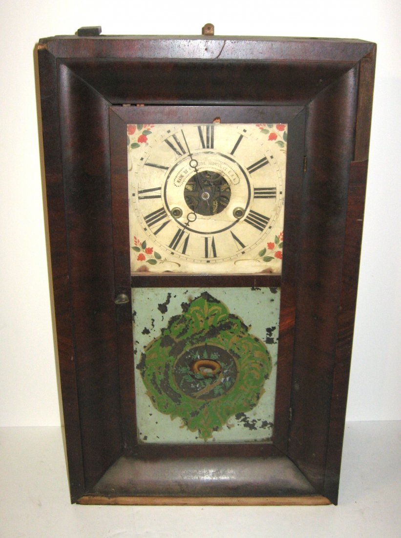 Chauncy Jerome Ogee shelf clock,: walnut 30 hour time and strike with brass works, 26" ht.