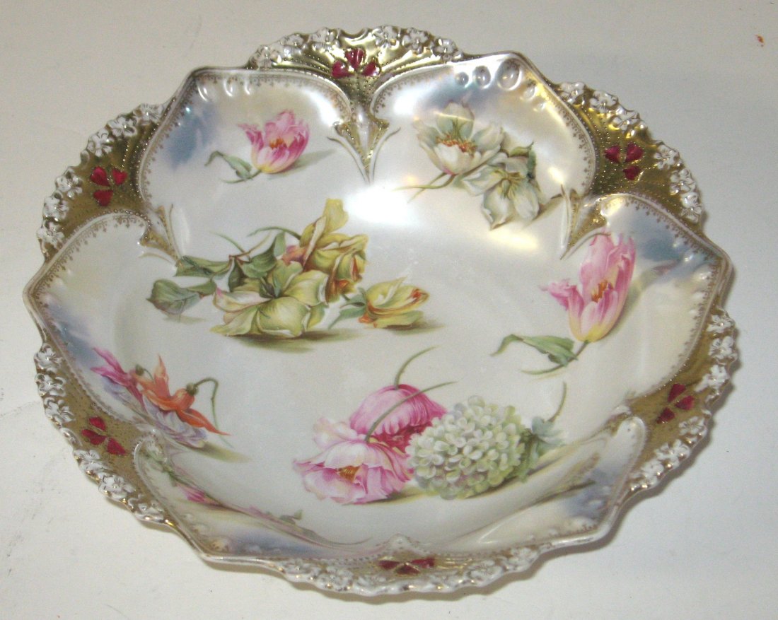 R. S. Prussian gilt highlighted bowl,: decorated with colorful flowers, marked with the red trademark, 10 1/2" wide.