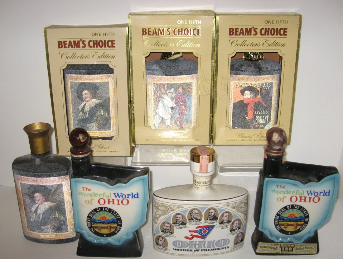 Seven Jim Beam decorated bottles,: all with broken seals and no spirits, three with original boxes. PROVENANCE: Larry Loxterman Collection.