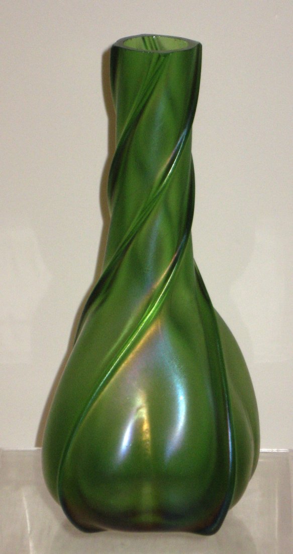 Loetz twist stem green vase,: bulbous stick form with blue highlights, 7 1/2" ht.