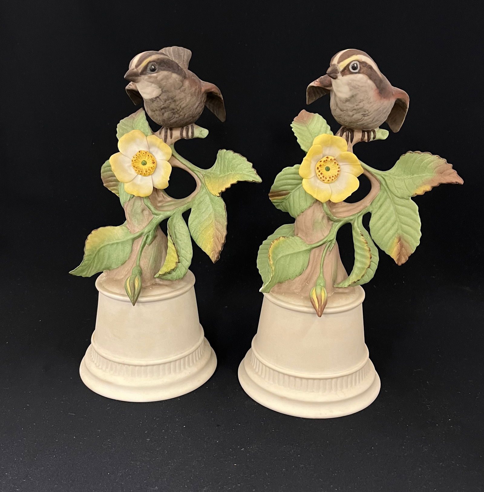 Two Boehm porcelain bird sculptures: Two matching Boehm porcelain bird sculptures of a White Throated Sparrow, 9 1/2" ht. PROVENANCE: Glenn Richard Mahler (Rick) was a sales rep for Boehm, Cybis, and LLadro. CONDITION: one minor leaf chi