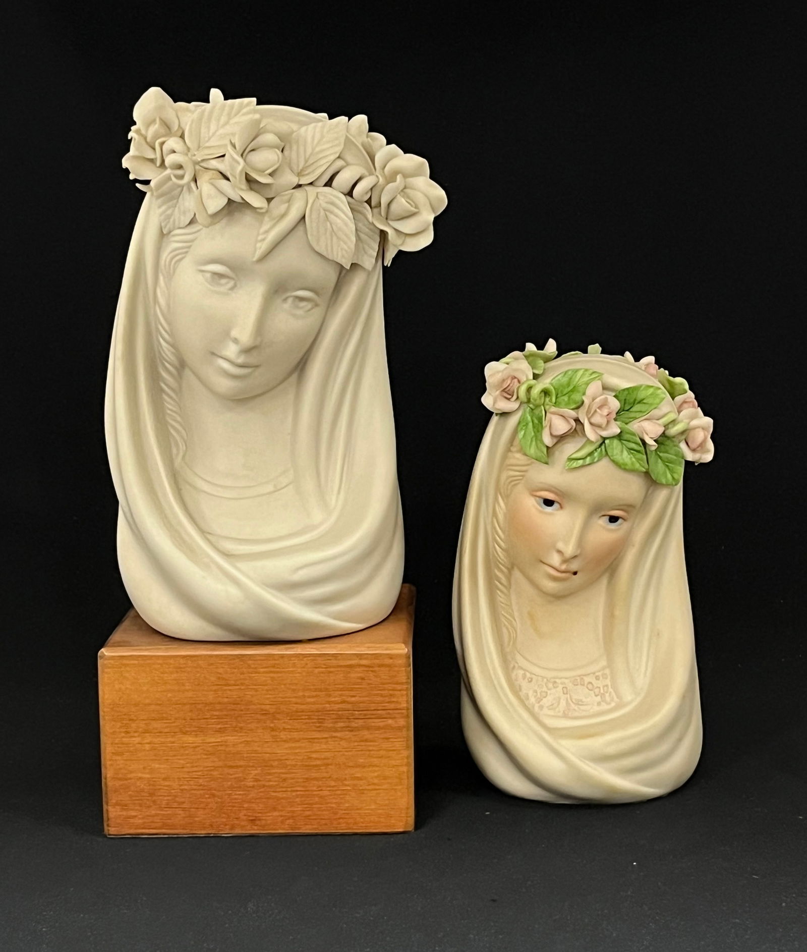 Two Cybis Madonna Queen of Angels Busts: Two Cybis Madonna Queen of Angels Bust Figurines, larger on wooden base; signed; tallest 10 1/2" ht. CONDITION: no chips, cracks, repairs or material defects found, Jaremos attempts to call any materi