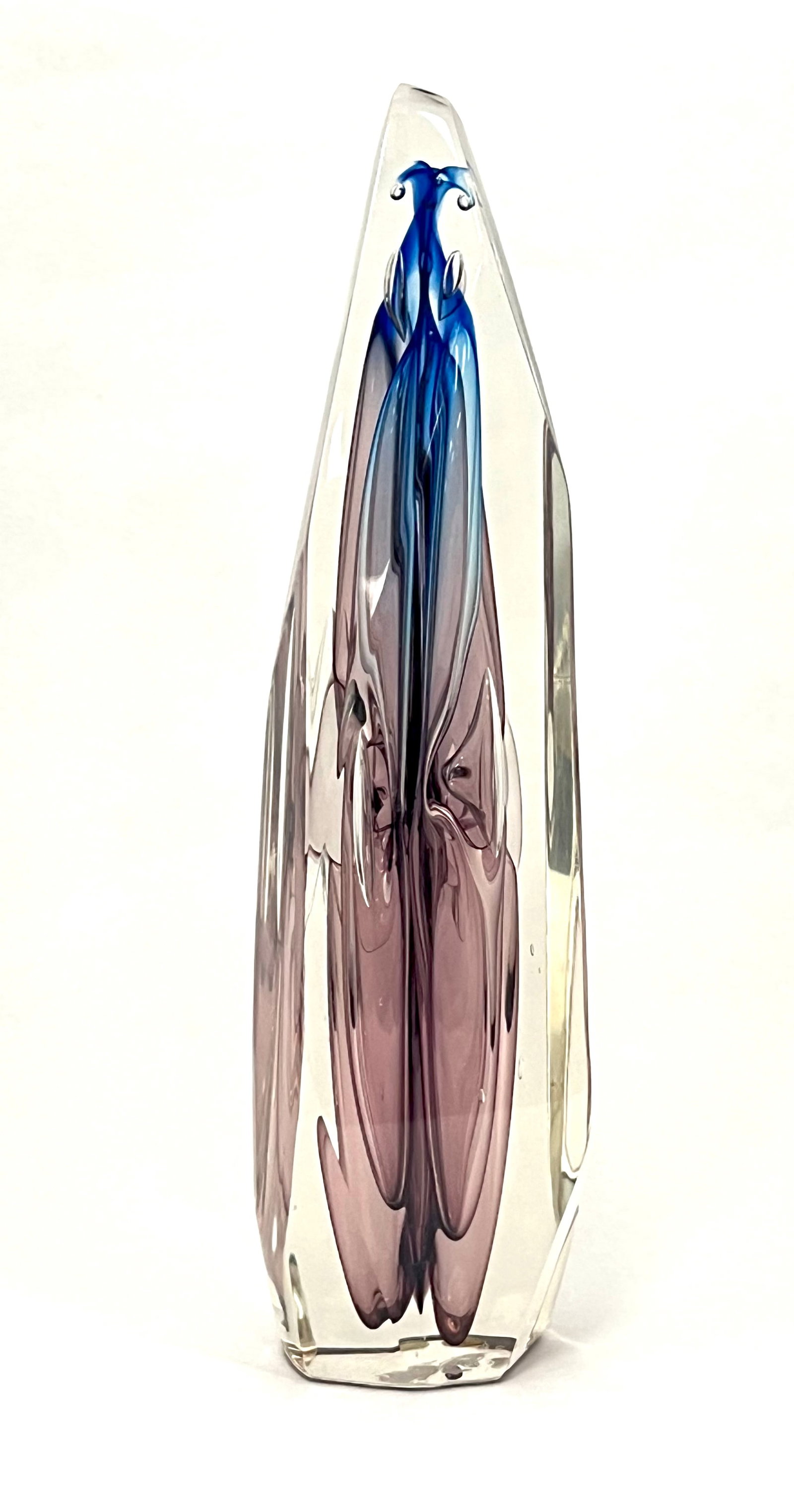 Paul Manners Art glass sculpture: Paul Manners Art Glass Sculpture in a free form tear drop form with blue and purple core, signed P Manners, 11 1/2" ht. CONDITION: no chips, cracks, repairs or material defects found, Jaremos attempts