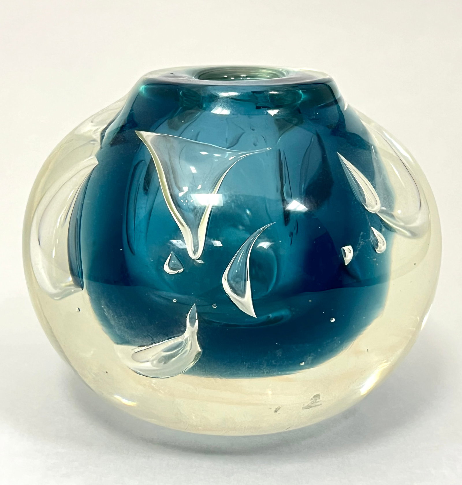 Dominick Labino paperweight: Dominick Labino ovoid paperweight vase in translucent glass decorated with air trap shards and a turquoise core, signed Labino 1985, 3 1/2" wide. CONDITION: no chips, cracks, repairs or material defec