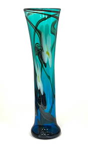 Richard Jolley cylindrical vase: Richard Jolley translucent green cylindrical vase decorated with large white flowers on dark blue stems, signed Richard Jolley 78, 12" ht. CONDITION: no chips, cracks, repairs or material defects foun