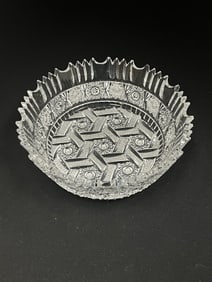 Scalloped rim cut glass bowl