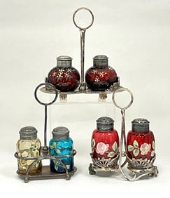 3 shaker sets and caddies