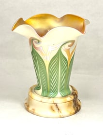 Quezal shade set on a marble base