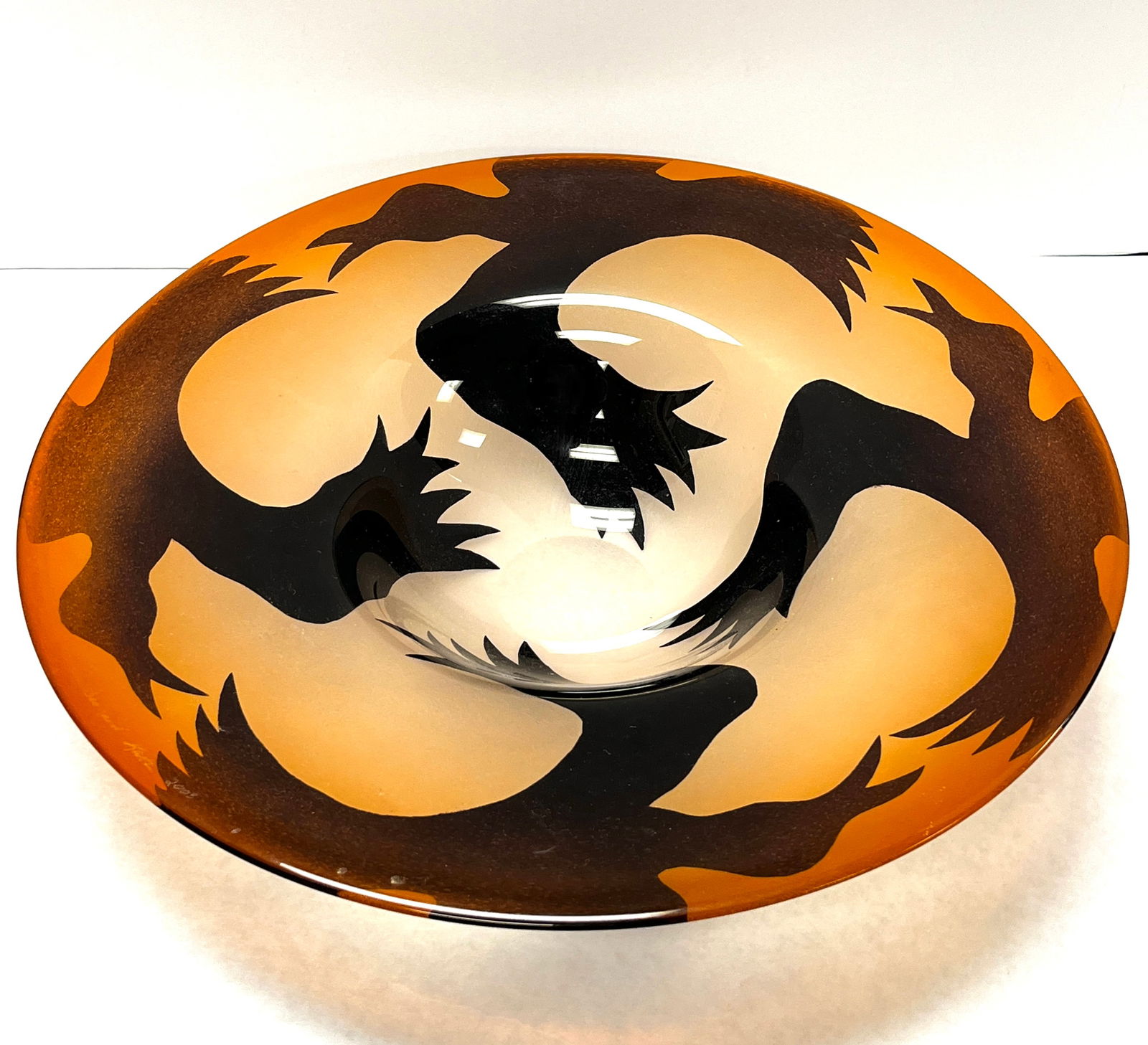 Bernard Katz cameo charger: Bernard Katz cameo glass charger in amber and orange decorated with cameo ravens, titled "Raven" signed Bernard Katz 2003, 15" wide. CONDITION: no chips, cracks, repairs or material defects found, Jar