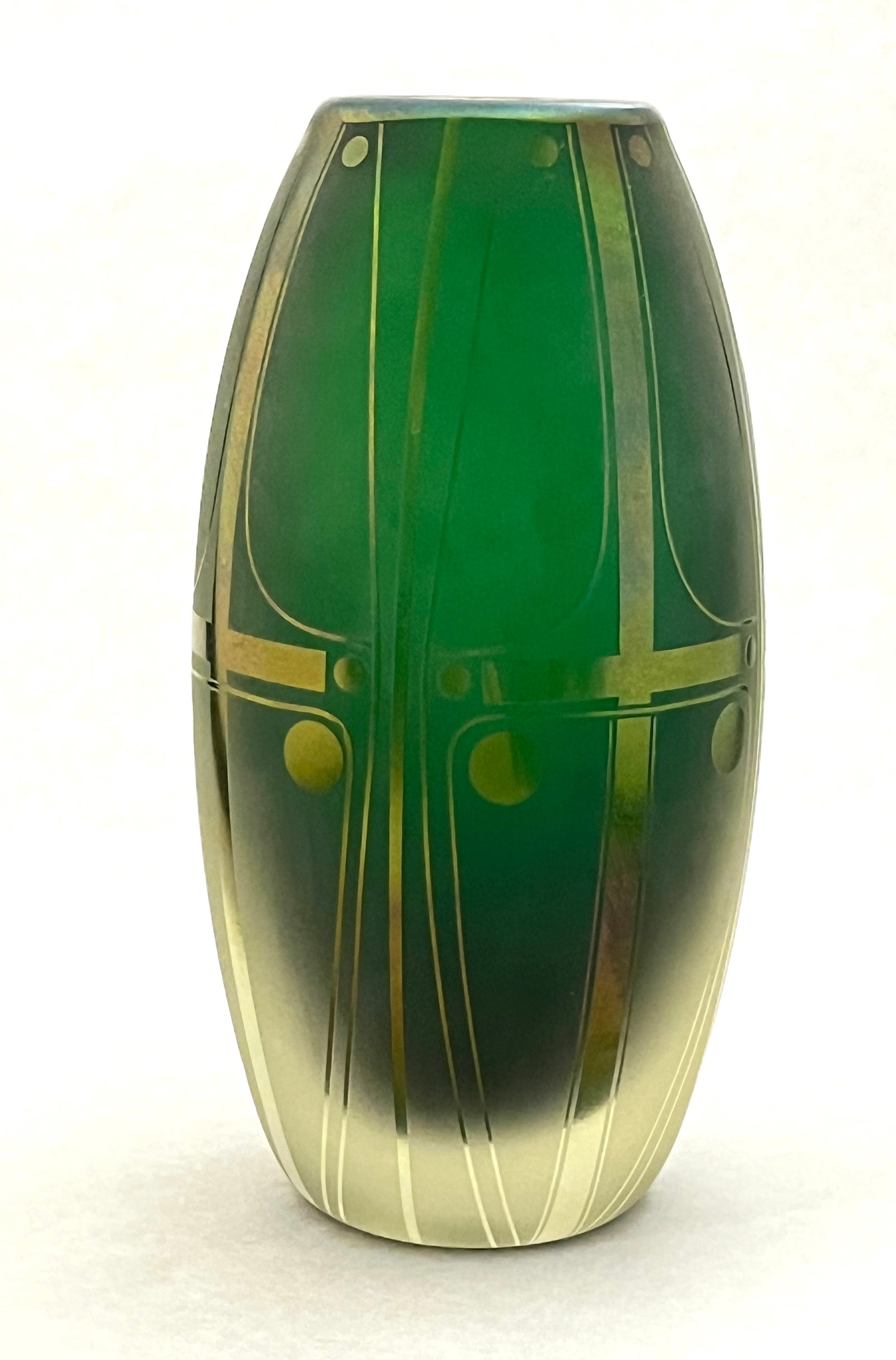 Orient and Flume glass vase: Orient and Flume glass vase, ovoid form in frosted green decorated with an iridescent gold Art Deco design, signed D Shura Orient and Flume, 9" ht. CONDITION: no chips, cracks, repairs or material def