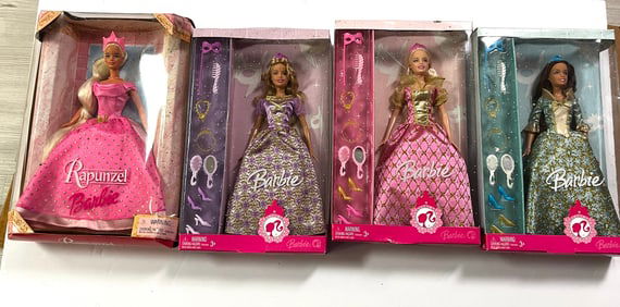 4 Barbie Dolls
