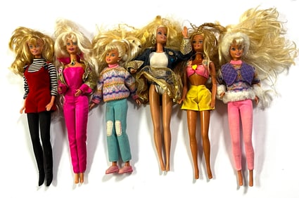 6 Barbie Dolls