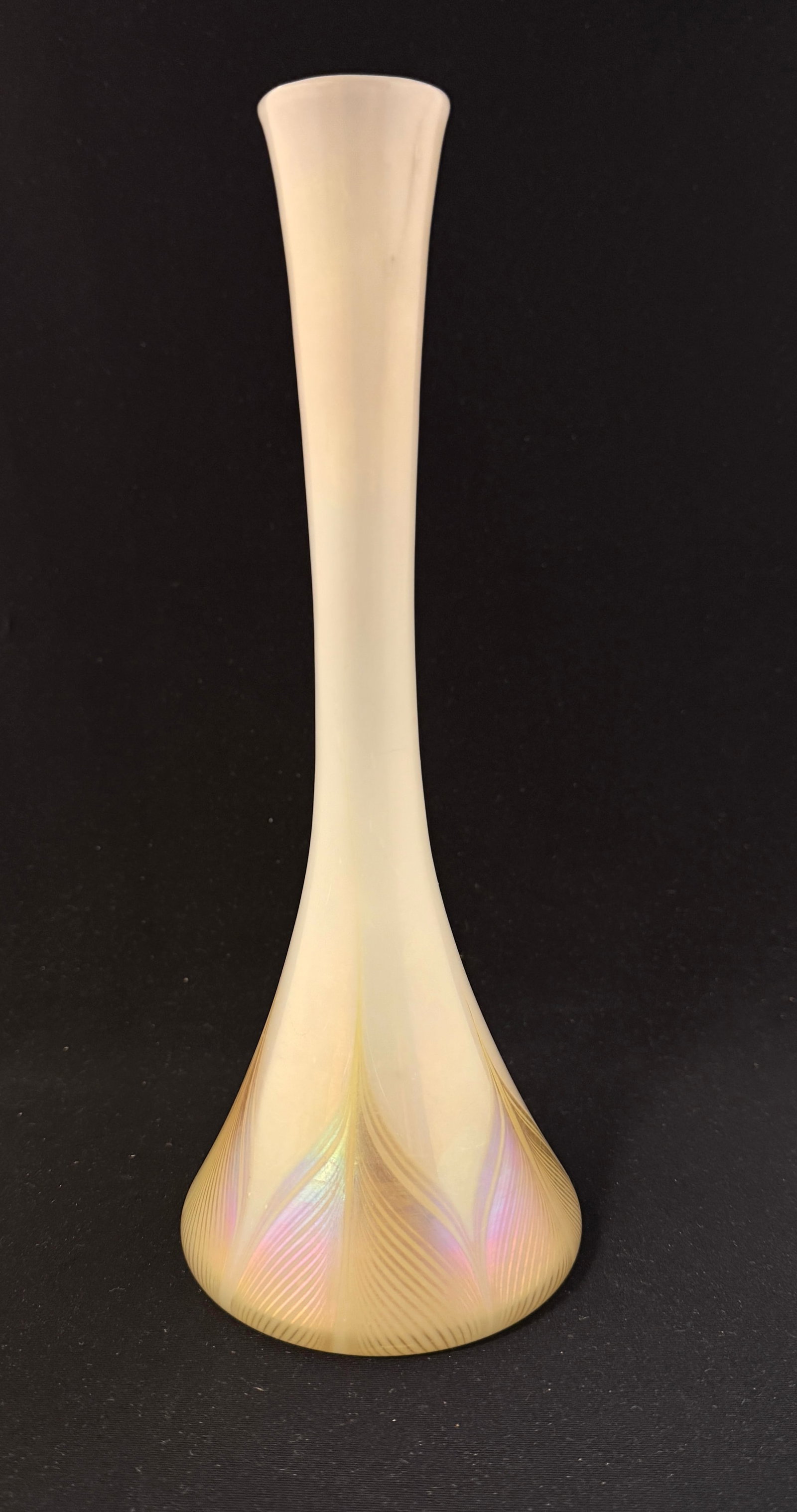 Tiffany Favrile glass vase: Tiffany reverse trumpet form glass vase in opal with a gold Favrile pulled feather at the foot, signed 3594 J L C Tiffany Favrile, 10 1/4" ht. CONDITION: no chips, cracks, repairs or material defects 